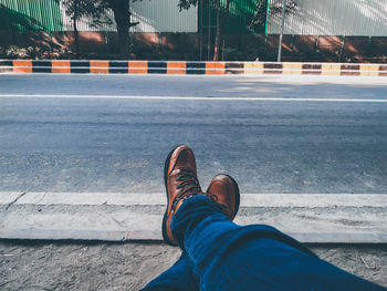 Low section of man on street