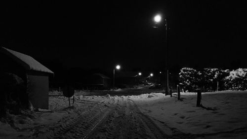 Illuminated street light at night