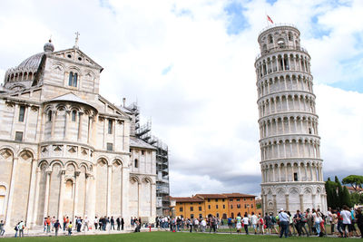 People in front of historical building