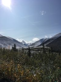 Scenic view of snowcapped mountains against sky