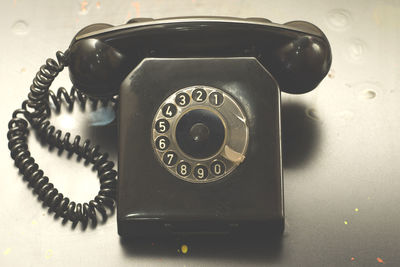 High angle view of telephone on table