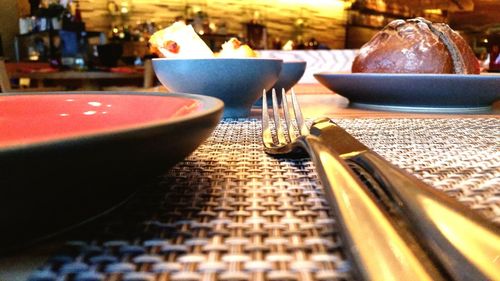 Close-up of chairs and table