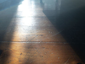 High angle view of shadow on floor