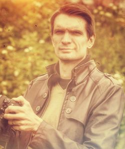 Close-up of young man smoking outdoors