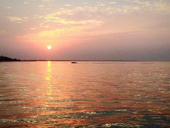 Scenic view of sea at sunset