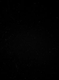 Scenic view of star field against sky at night
