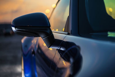 Close-up of vintage car on side-view mirror