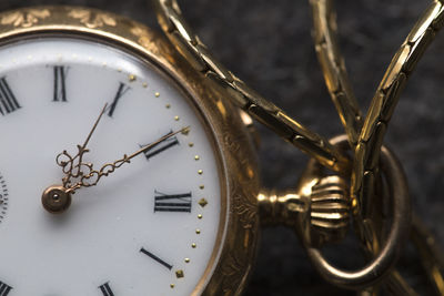 Close-up of pocket watch