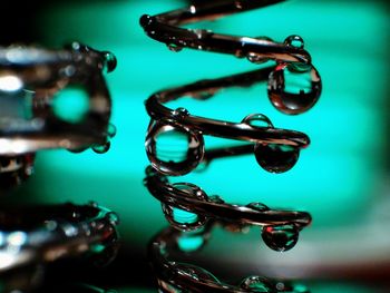 Close-up of water drops on table