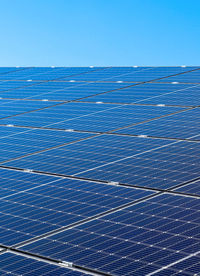 Generating clean energy with solar modules in a big park in northern europe.