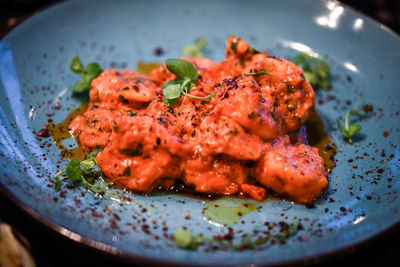 High angle view of meat in plate on table