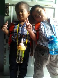 Full length portrait of cute girl standing