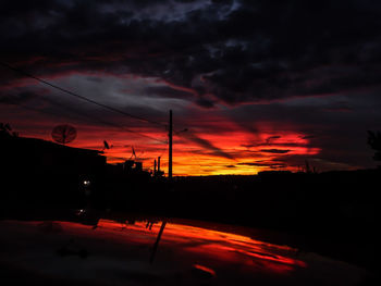 Scenic view of dramatic sky during sunset