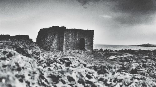 View of old ruin building against sky