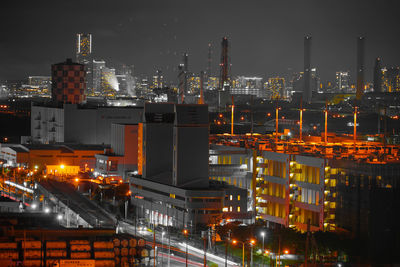 Illuminated buildings in city at night