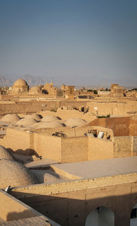 View of buildings against clear sky