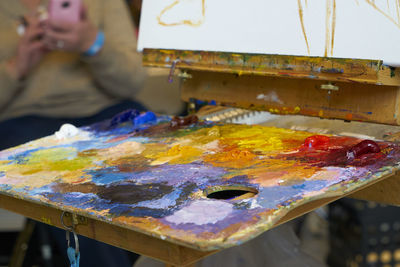 High angle view of artist palette on table