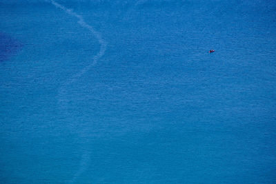 High angle view of blue sea