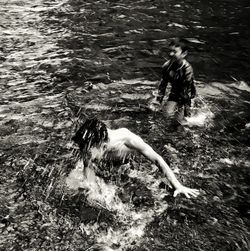 High angle view of men in water