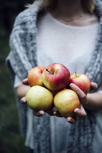 Woman holding apples