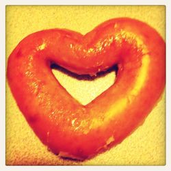 Close-up of red heart shape on table