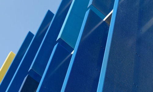 Abstract view of a blue facade with large plastic panels