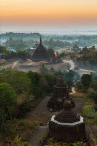 Scenic view of pagodas during sunset