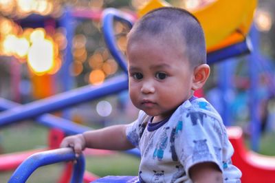 Portrait of cute boy looking away