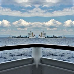 Boats sailing in sea