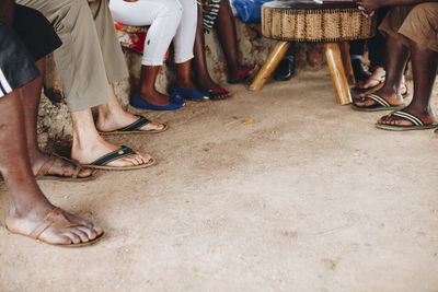 Low section of people sitting outdoors