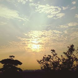 Scenic view of landscape against sky at sunset