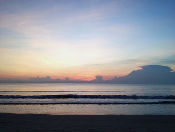 Scenic view of sea against sky at sunset