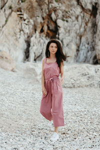 Full length of woman walking at beach