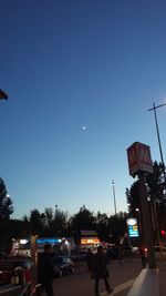 Cars on road against clear sky