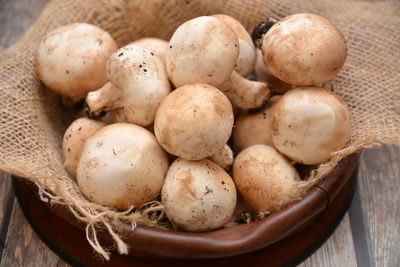 High angle view of eggs in basket on table