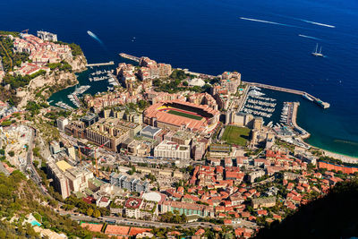 High angle view of cityscape by sea