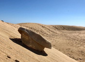 Scenic view of desert against clear sky