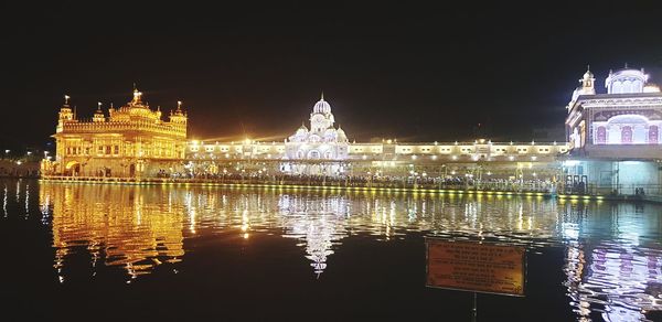 Illuminated buildings at waterfront