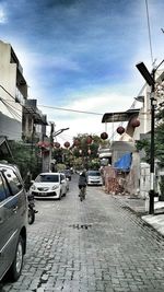 Road with buildings in background