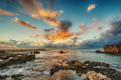 Scenic view of sea at sunset