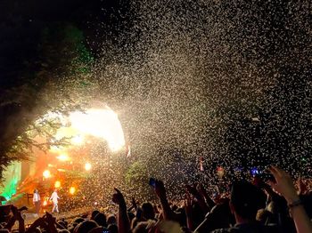 Firework display at night