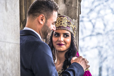 Bride with bridegroom during weeding ceremony