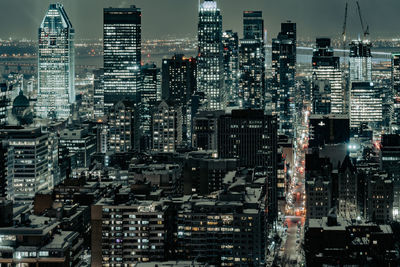 High angle view of illuminated cityscape at night