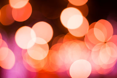 Defocused image of illuminated lights at night