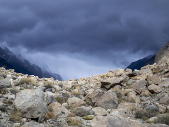 Rocks on mountain against sky