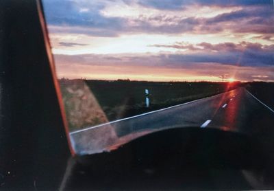 Road seen through car windshield