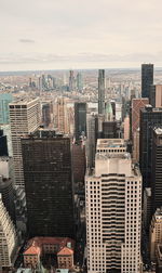 High angle view of buildings in city against sky