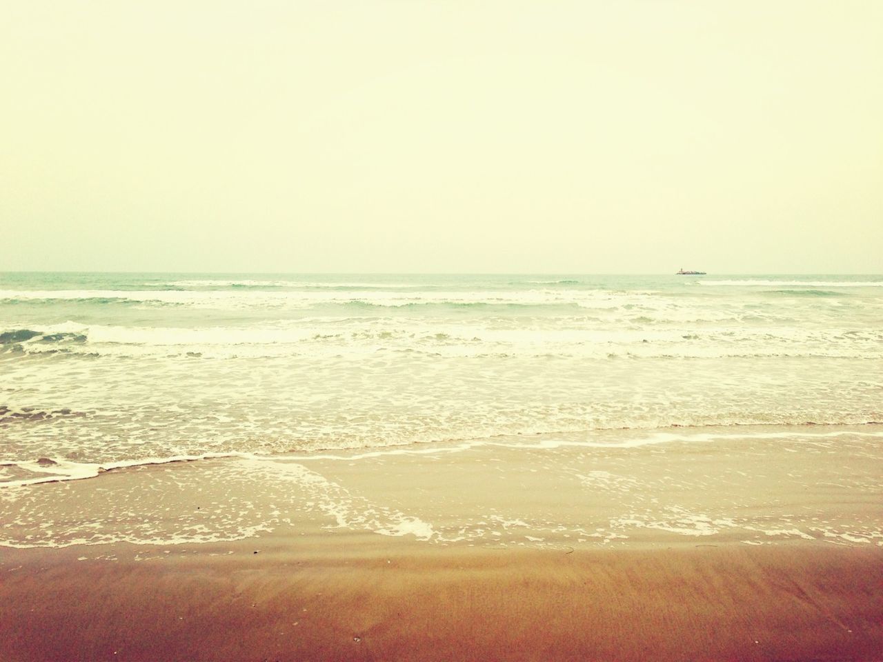 sea, horizon over water, beach, water, clear sky, sand, shore, scenics, tranquil scene, copy space, tranquility, beauty in nature, wave, nature, surf, idyllic, seascape, remote, sky, coastline