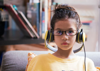 Portrait of boy wearing eyeglasses