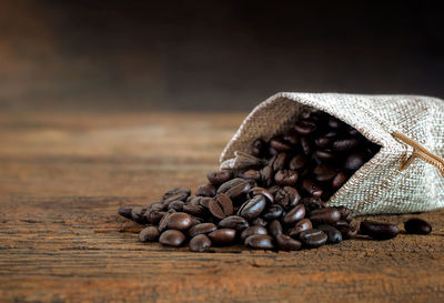 Close-up of coffee beans on table